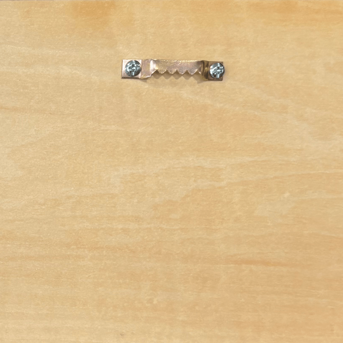 Hanging hardware on the back of a wooden sign for easy mounting. Ideal for personalized garage sign.