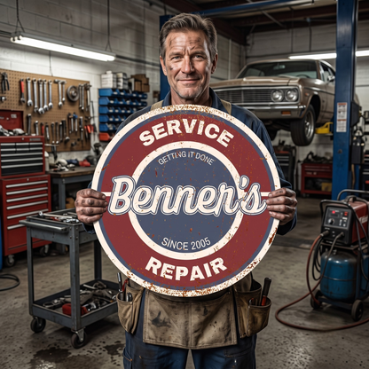 Personalized Garage Sign showcasing vintage style, held by a mechanic in an auto repair shop.