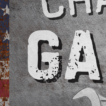 Close-up of a personalized Metal Garage Sign with weathered design and American flag elements.