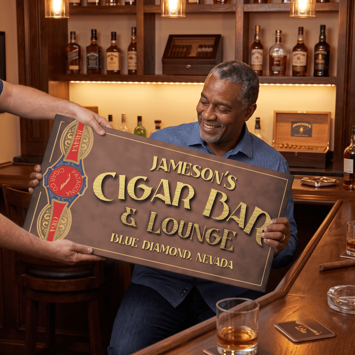 Man holding a personalized Cigar Bar Sign in a cozy home bar setting, featuring rich wood and whiskey décor.