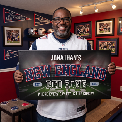 New England Football Sign held by fan in Patriots jersey, personalized for Jonathan, perfect for man cave decor.