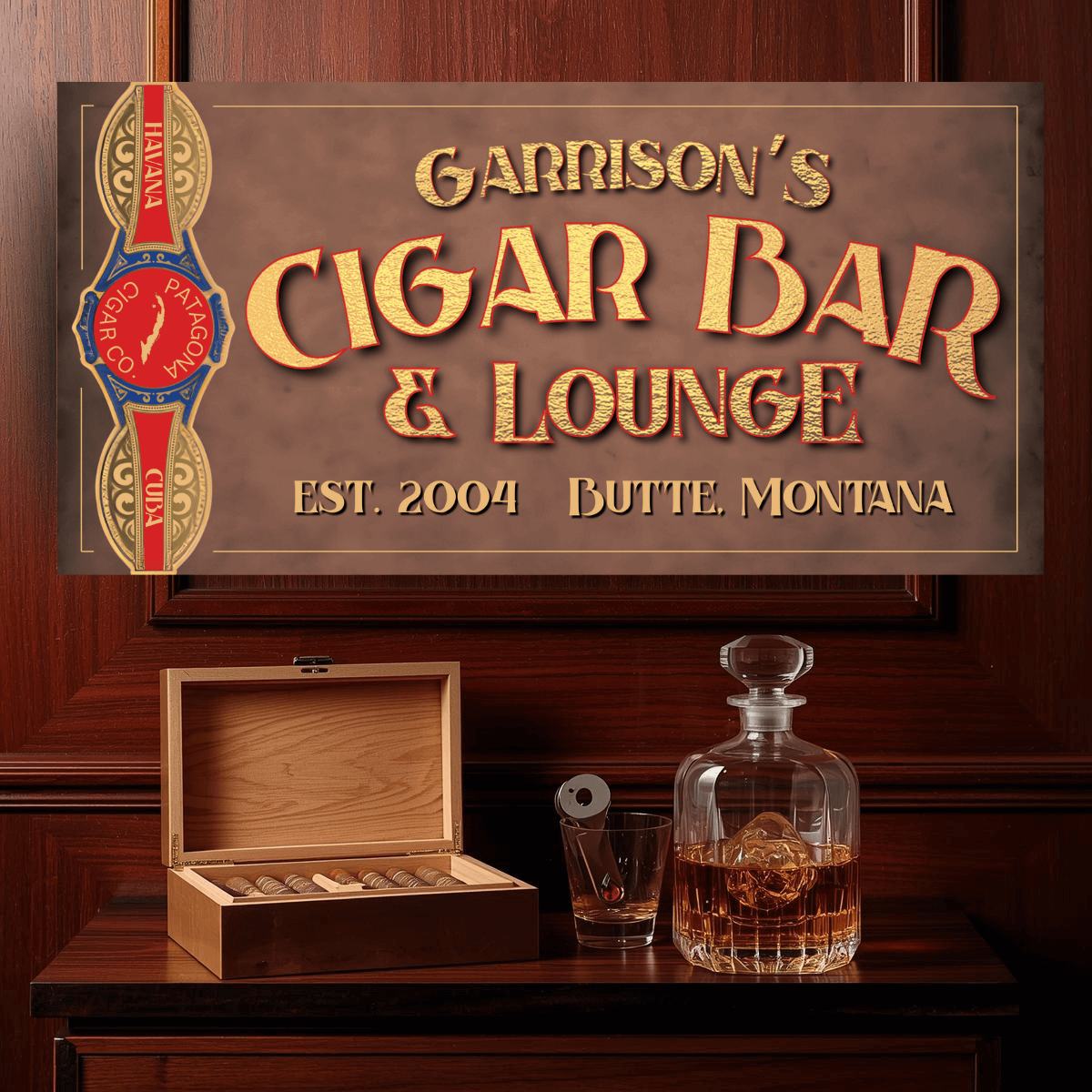 Garrison's Cigar Bar & Lounge sign with a wooden table featuring a humidor, glass, and decanter.